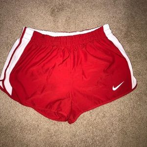 Red Nike shorts